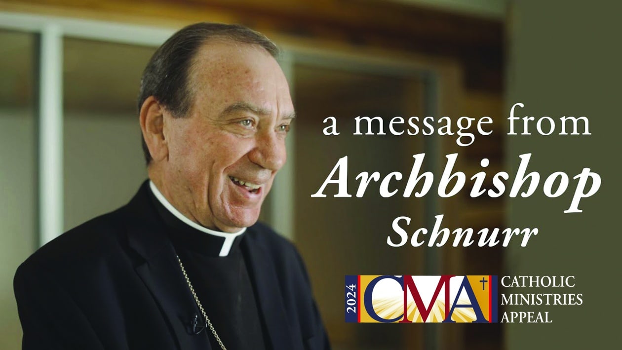 Archbishop Schnurr smiles and is facing to the right of camera. CMA logo in front of image